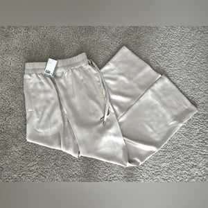 NWT. H&M satin high waisted wide leg cream pants. Size 2. Never worn.
